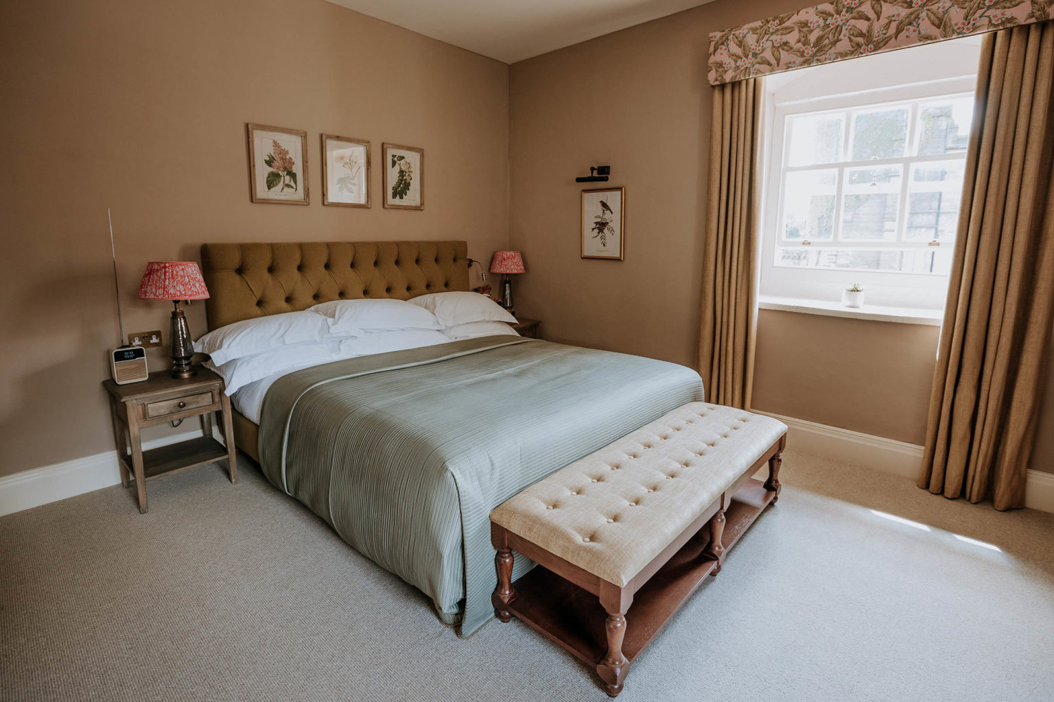 The bedroom of the Fearby Knights room at the Swinton Park dog-friendly spa hotel in North Yorkshire