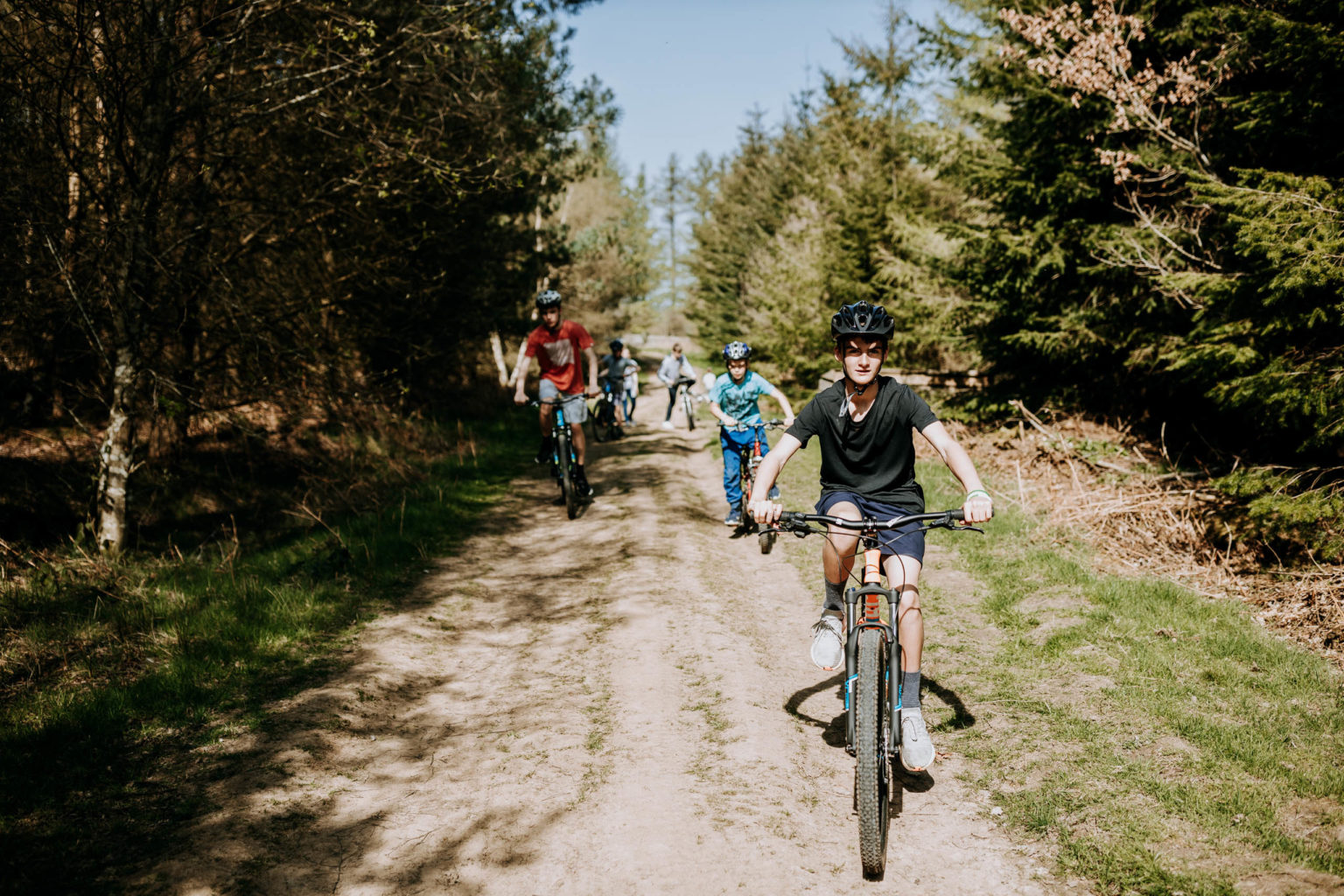 Children cycling offroad at Swinton Bivouac in North Yorkshire