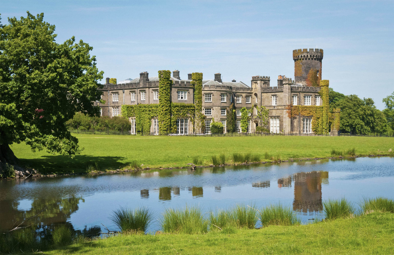 Exterior photo of the luxury Swinton Park castle hotel on the Swinton Estate, where you can stay in North Yorkshire