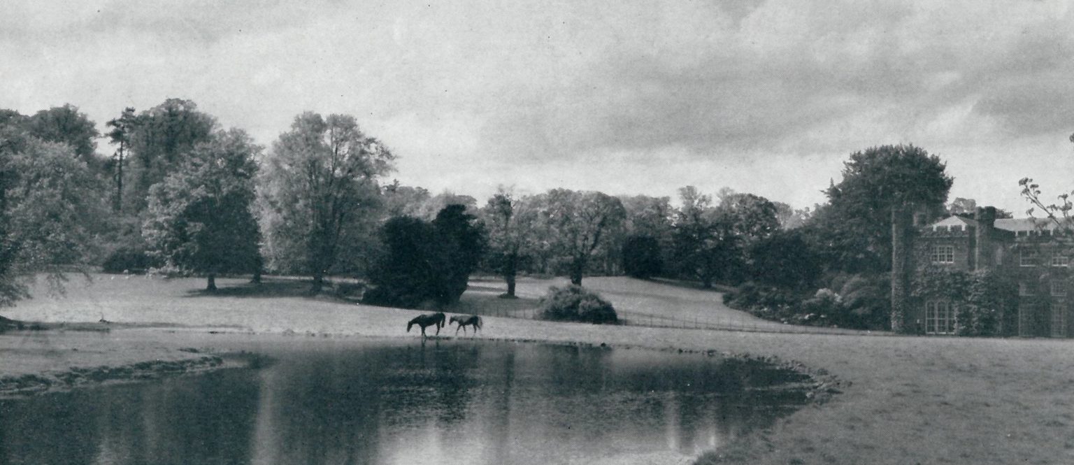 An old photo of horses by the lake at Swinton Park in North Yorkshire