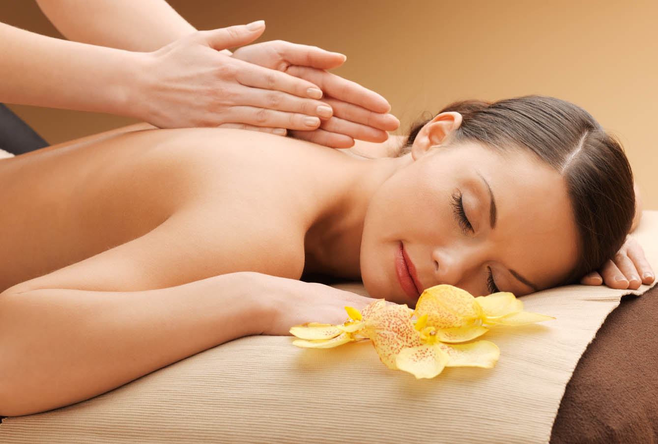 A woman having a massage during a relaxing spa day