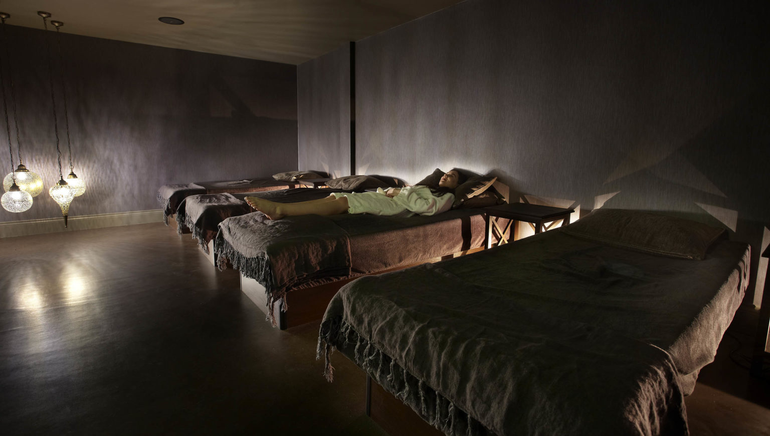 A dark relaxing room used by spa day guests at Swinton Country Club and Spa on the Swinton Estate in North Yorkshire