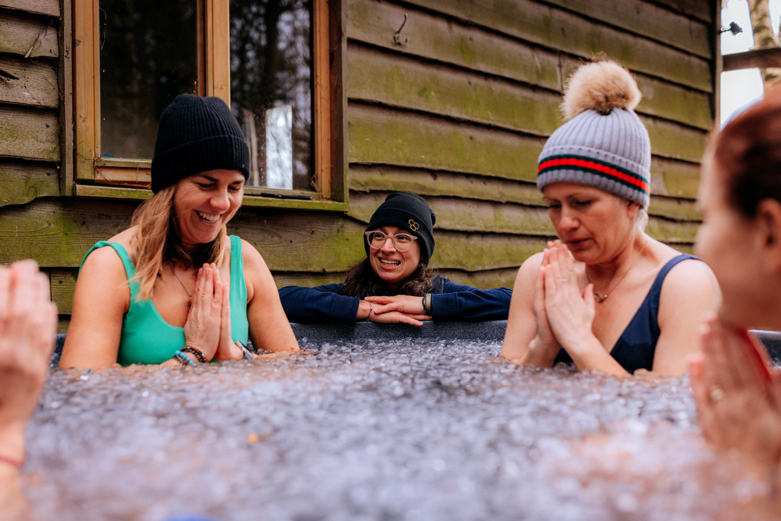 People in an ice cold tub during a Wim Hof retreat