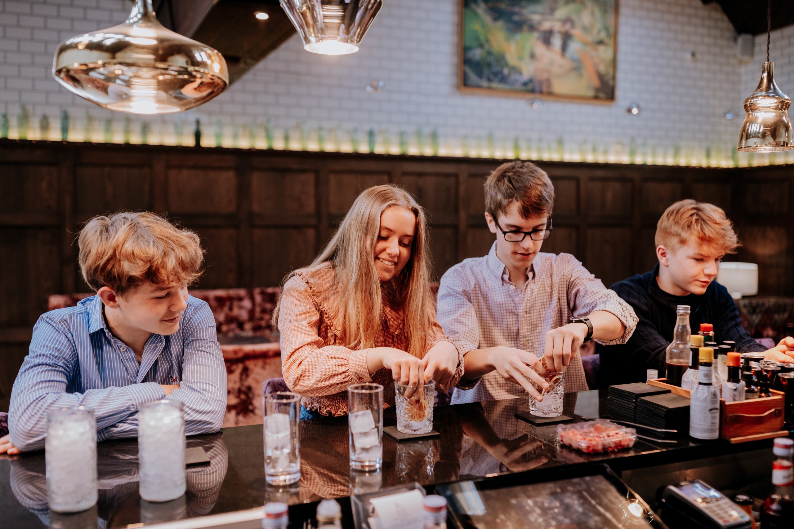 Teenagers making mocktails during a course at The Terrace Restaurant and Bar on the Swinton Estate in North Yorkshire.