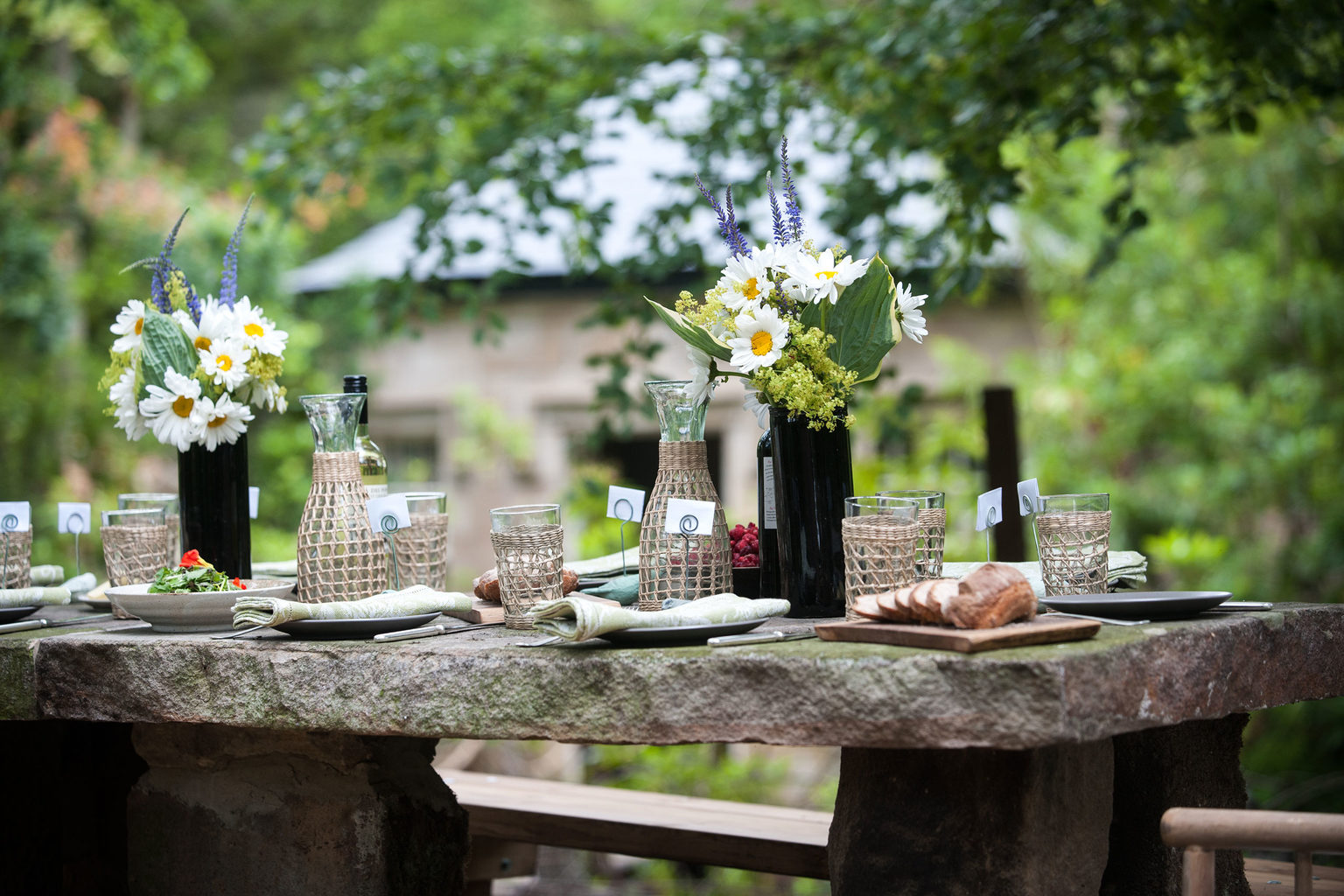 A table set up for an outdoor party at the Lake House private island on the Swinton Estate in North Yorkshire