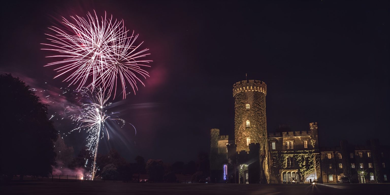 Fireworks over the castle turret at Swinton Park Hotel on the Swinton Estate in North Yorkshire