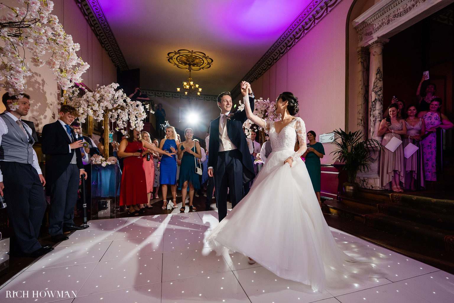 Bridge and groom's first dance during a wedding reception at Swinton Estate in North Yorkshire. Photo by Rich Howman.