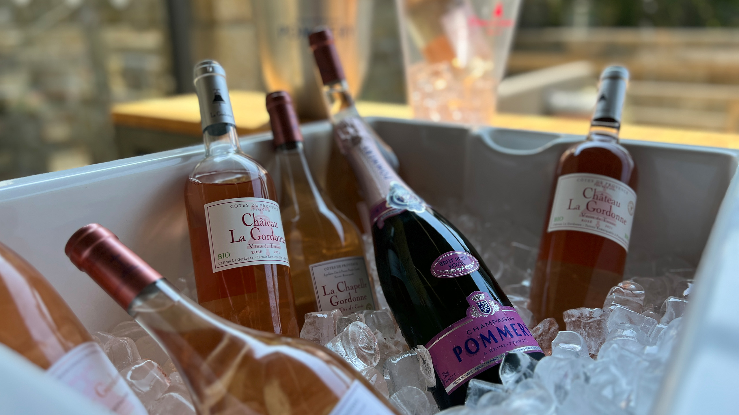 Bottles of rose wine in an ice cooler at The Terrace Restaurant and Bar's summer Rose Bar on the Swinton Estate